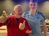 Twee glimlachende mannen.